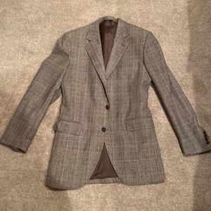 Dolce & Gabbana two piece suit. Made in Italy. Size 40L.